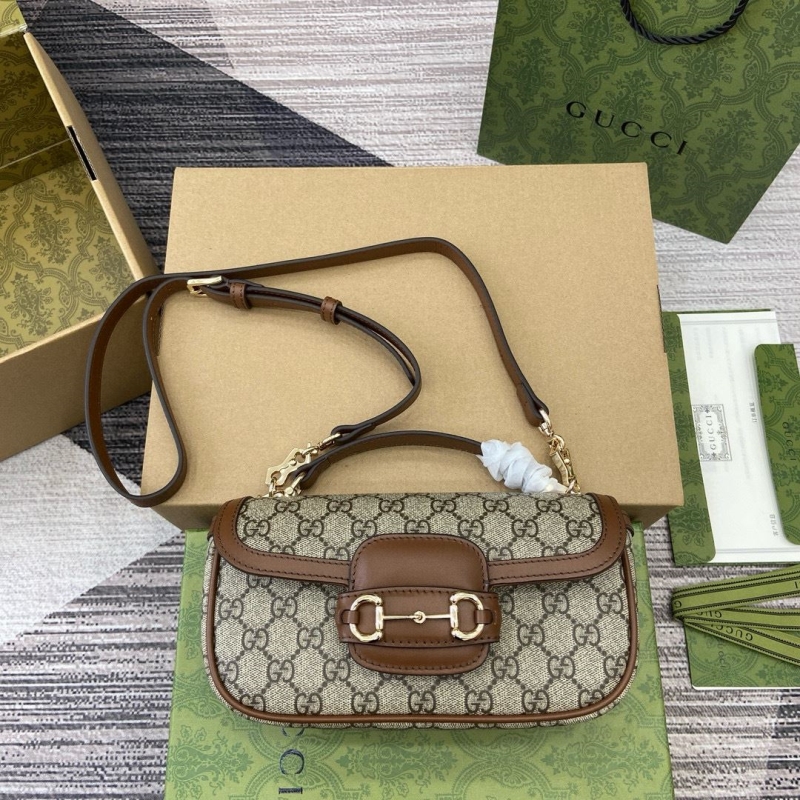 G*u*i top handle bags